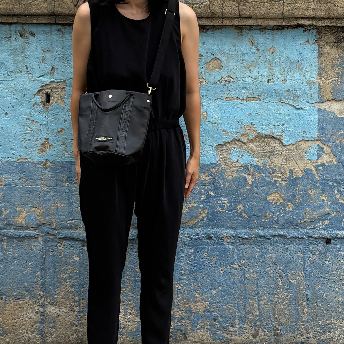 "Lightweight and wipeable" PVC processed (round bottom tote) in black camouflage