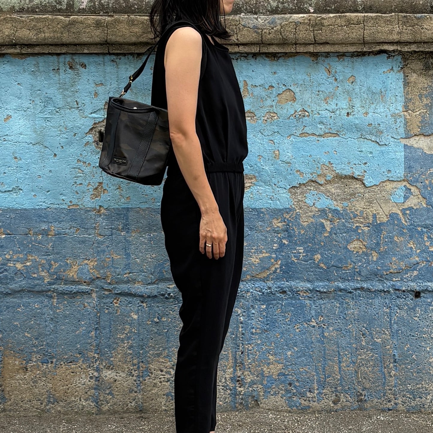 "Lightweight and wipeable" PVC processed (round bottom tote) in black camouflage