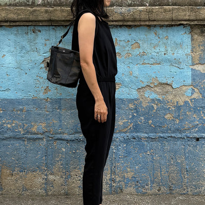 "Lightweight and wipeable" PVC processed (round bottom tote) in black camouflage