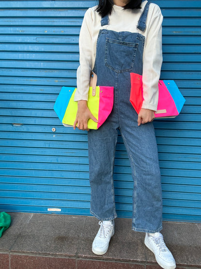 Comes with a multi-colored bag and a free pouch