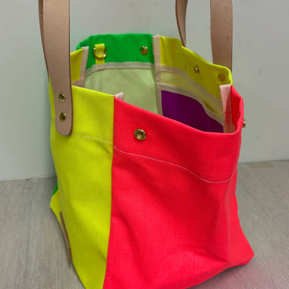 Comes with a multi-colored bag and a free pouch