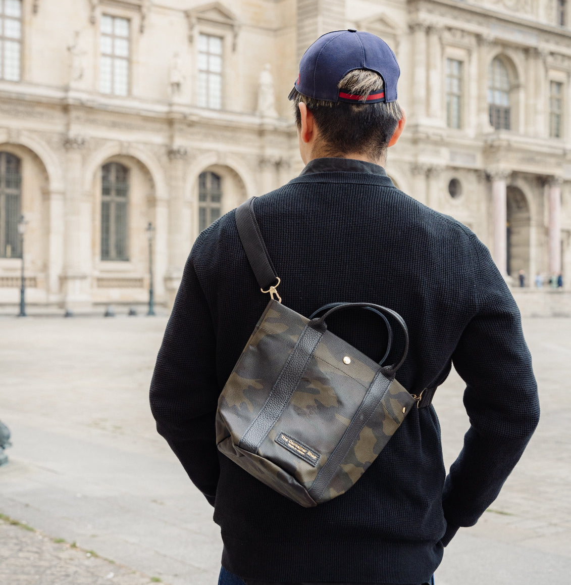 "Lightweight and wipeable" PVC processed (round bottom tote) in black camouflage