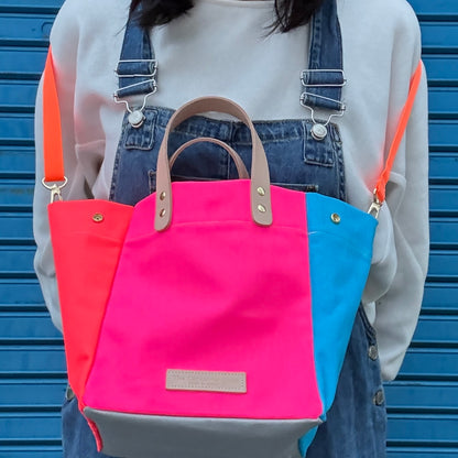 Comes with a multi-colored bag and a free pouch