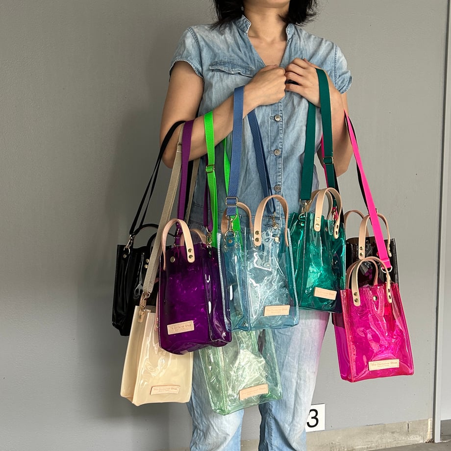 Colored PVC clear bag (pochette) dark brown